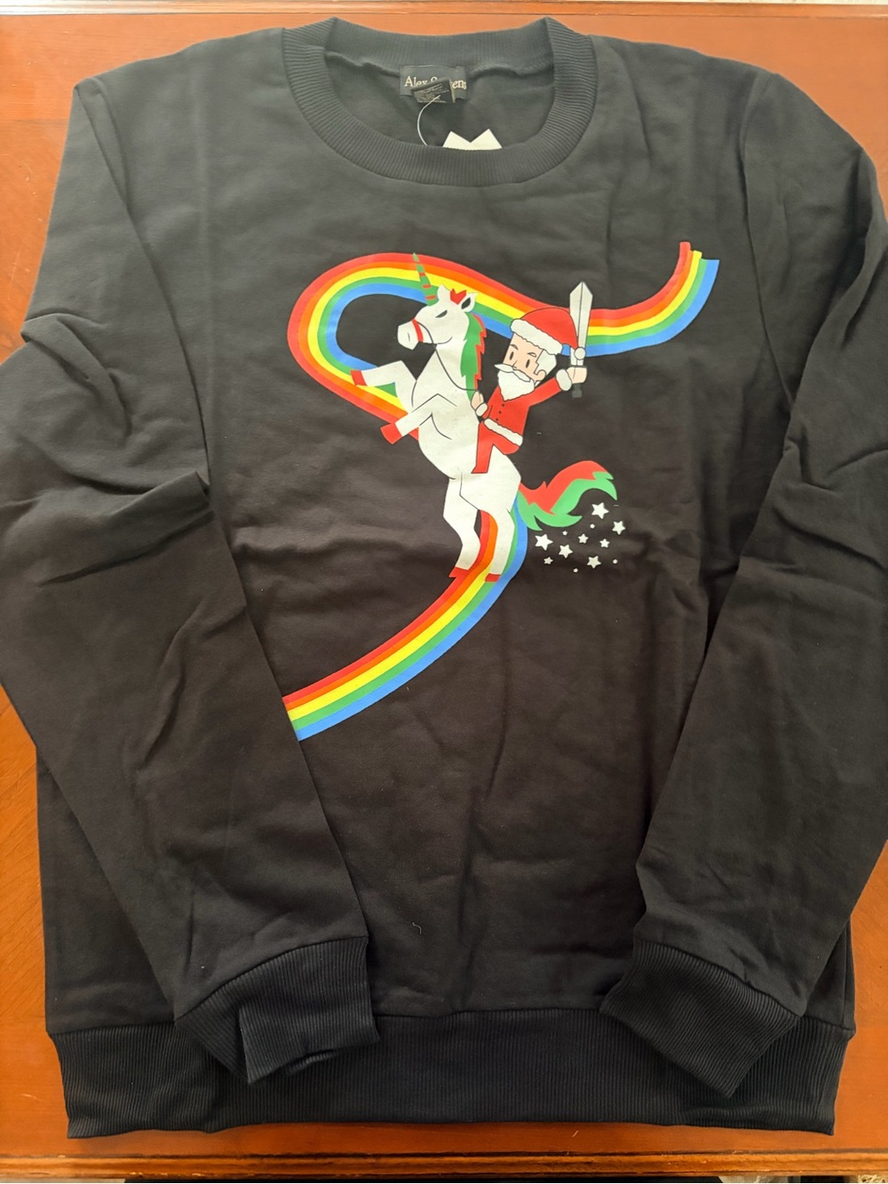 Alex Steven’s Black Crewneck Sweater with Rainbow Unicorn Santa Graphic